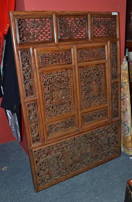 Lot 1261 - A Chinese Decorative Window Panel, 20th century, with foliate carved panels and shutter doors,...