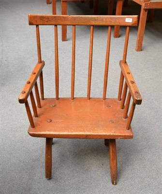 Lot 1284 - An Orange Painted Windsor Armchair, probably West Country, early 19th century, with curved top rail