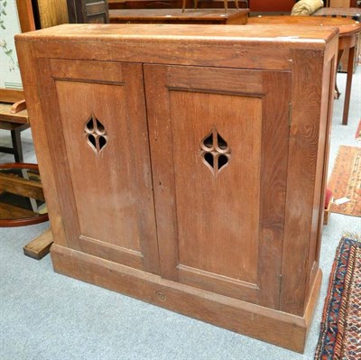 Lot 1295 - An Oak Cupboard, with panel doors with Gothic tracery, 110cm wide