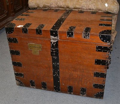 Lot 1305 - A Late 19th Century Oak and Metal Bound Hinged Trunk, with brass plaque E.Martin Smith Esq.,...