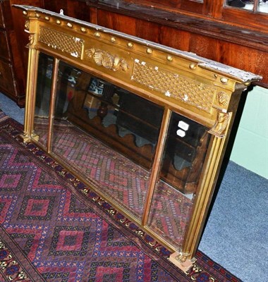 Lot 1328 - A 19th Century Egyptian Revival Gilt and Gesso Overmantel Mirror, 137cm wide