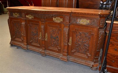 Lot 1334 - An Impressive Victorian Carved Oak Sideboard, stamped W Walker & Sons Bunhill Row, 242cm long