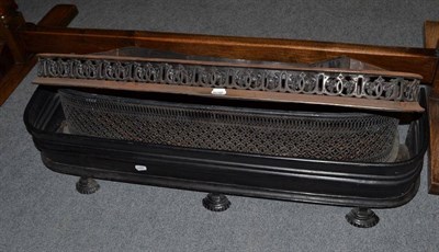 Lot 1339 - A 19th Century Steel Fire Curb, with pierced decoration on flattened bun feet, 97cm long;...