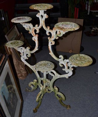 Lot 1369 - A Victorian Cast Iron Conservatory Plant Stand with six circular platforms, height 103cm