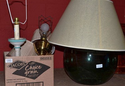 Lot 1393 - A Large Green Glass Carboy Bottle, converted into a lamp, 70cm high; and Four Other Small Table...