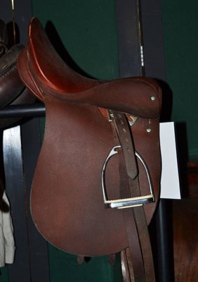 Lot 1427 - A Bulmer Dressage Saddle by Turf & Travel, Bucks, in pigskin, with stirrup leathers and...