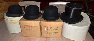 Lot 1433 - A Black Silk Top Hat, by S Patey (London) Ltd; A Child's Black Bowler Hat; and Two Lady's Black...