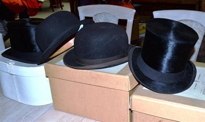 Lot 1437 - Two Boxed Black Silk Top Hats; A Boxed Bowler Hat, by Herbert Johnson; and An Unboxed Bowler...