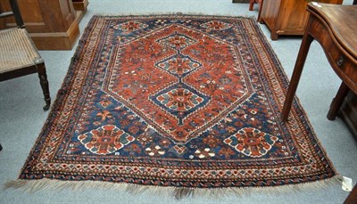 Lot 1464 - Khammseh Rug South West Persia The lozenge field centred by three stepped medallions framed by...