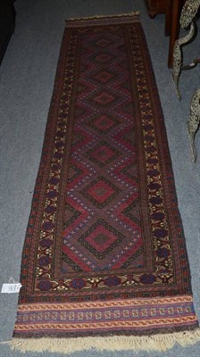 Lot 1467 - Very Narrow Balouch Runner  West Afghanistan The field with a column of radiating diamond...