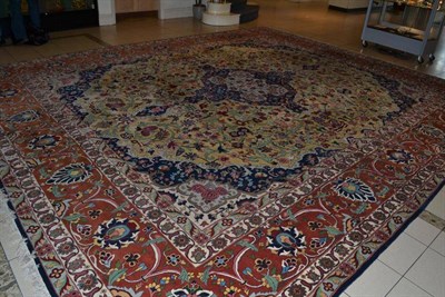 Lot 1469 - A Large Finely Woven Indian Carpet The lemon field richly decorated with scrolling floral vines...