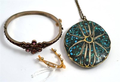 Lot 13 - A pearl set wishbone brooch, stamped '750', a garnet set bangle and a turquoise mosaic pendant...