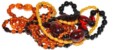 Lot 26 - Five assorted bead necklaces, some amber