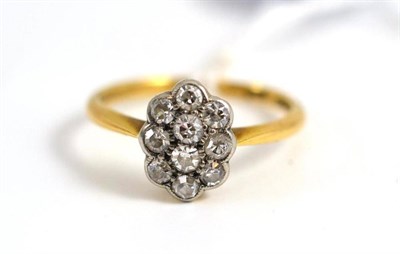 Lot 30 - A diamond cluster ring stamped '18CT', total estimated diamond weight 0.45 carat approximately