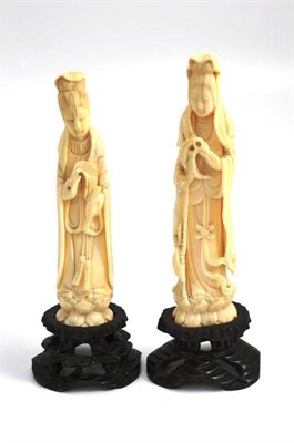 Lot 34 - Two carved ivory 'Guanyin' figures on stands