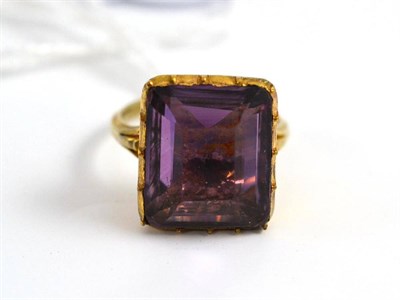 Lot 38 - A foil backed amethyst ring