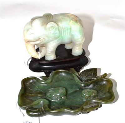 Lot 42 - Chinese jadeite elephant and wood stand and green jade brush washer with frogs