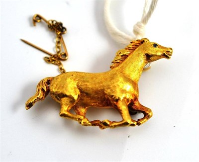 Lot 54 - An 18ct gold horse brooch