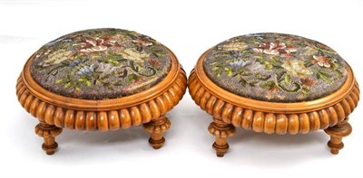 Lot 65 - A pair of Victorian walnut beaded footstools