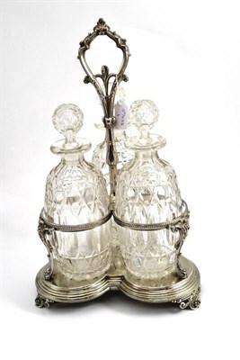 Lot 91 - An old Sheffield plate three bottle tantalus, height 40cm