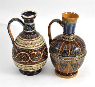 Lot 111 - Two Doulton stoneware jugs (a.f.), height 22cm each