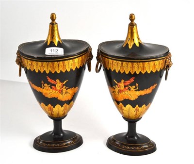 Lot 112 - A pair of Toleware urn shaped vases and covers, height 32cm and a Victorian brass letter rack