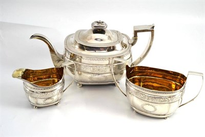 Lot 115 - A late Georgian three piece tea set, London 1809