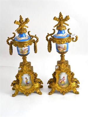 Lot 122 - A pair of late 19th century gilt metal garnitures with Sevres style porcelain mounts, height 40cm