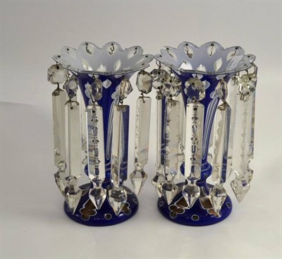 Lot 142 - A pair of Bohemian blue glass overlay drop lustres, height 20cm