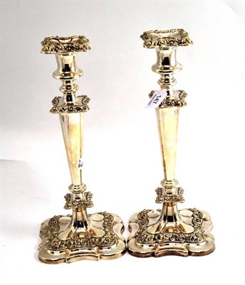 Lot 147 - A pair of 18th century style plated candlesticks, height 32cm