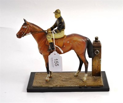 Lot 155 - A cold painted spelter lighter as a jockey and horse