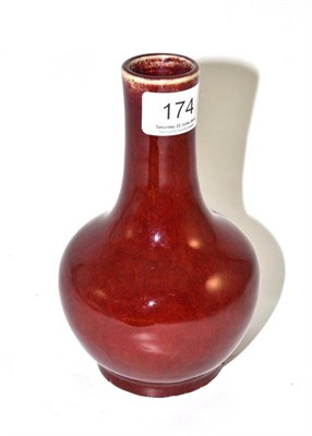 Lot 174 - Chinese sang de boeuf vase, height 18cm, with paper label 'Frank Partridge & Sons Ltd, 26 King...