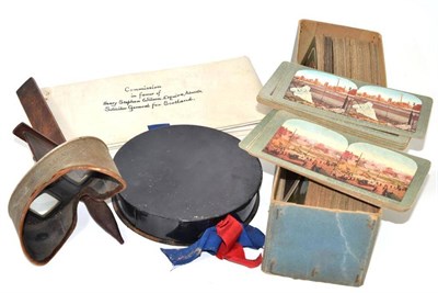 Lot 198 - A stereocard viewer, a quantity of cards and a document dated 1965 with plaster seal