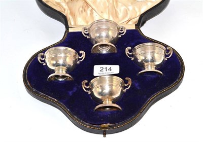 Lot 214 - Cased set of four silver trophy cup salts