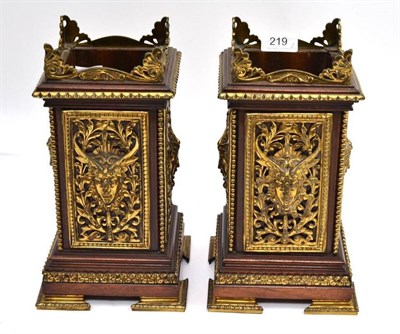 Lot 219 - A pair of Victorian walnut and brass mounted vases, height 28cm