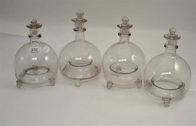 Lot 232 - Four glass wasp catchers