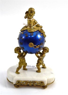 Lot 234 - A 19th century French globe timepiece, surmounted by gilt metal cherubs, height 20cm