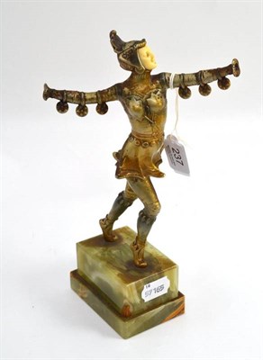 Lot 237 - An Art Deco spelter and ivorine figure of a female dancer, on a green stepped onyx base, 28cm...