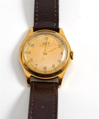 Lot 243 - A 9ct gold wristwatch signed Tissot