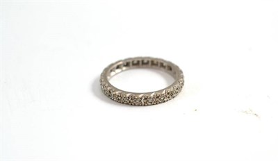 Lot 262 - An 18ct white gold and diamond eternity ring