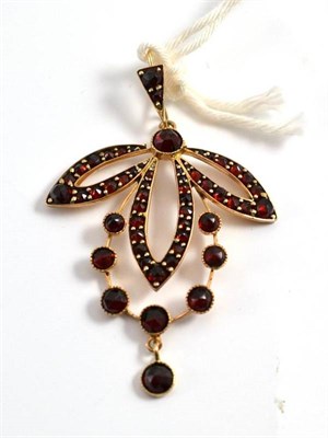 Lot 263 - A rose cut garnet set pendant