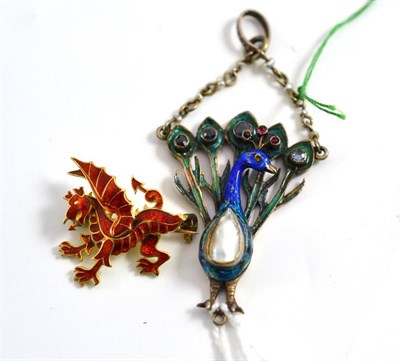 Lot 264 - 18ct gold enamel brooch of a dragon and enamel decorated peacock (2)