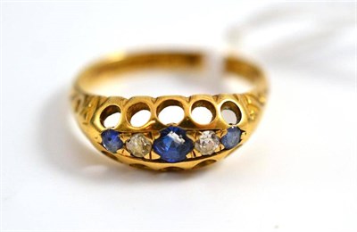 Lot 265 - An 18ct gold sapphire and diamond ring