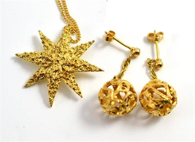 Lot 273 - A star pendant on chain and a pair of drop earrings