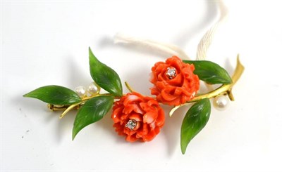 Lot 301 - A coral, nephrite, cultured pearl and diamond set floral brooch, stamped '585'