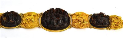 Lot 318 - A Chinese tortoiseshell and gold bracelet