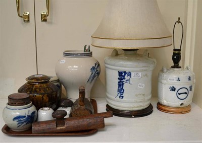 Lot 330 - A Japanese table lamp, height 28cm; a smaller example; a Japanese glazed barrel; and a tray...