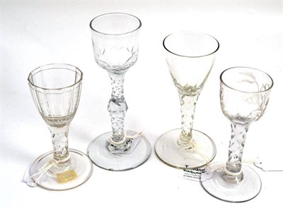 Lot 359 - A wine glass, circa 1780, with ogee shaped bowl and faceted knopped stem on plain conical foot,...