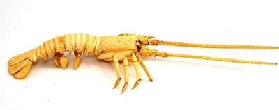 Lot 379 - Japanese carved and articulated bone crayfish, 28cm long