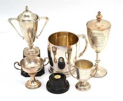 Lot 388 - Silver mug engraved 'Harrogate 1937'; trophy cup, 1891; and a silver trophy cup 1935